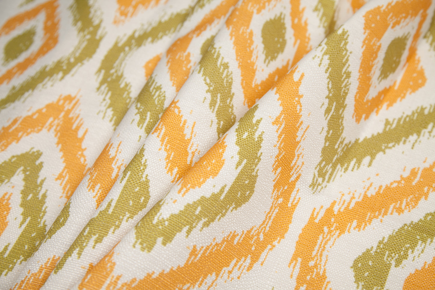 Spanish Green/Orange Ikat-Like Geometric Poly/Cotton Canvas - Folded Spanish Green/Orange Ikat-Like Geometric Poly/Cotton Canvas - Folded