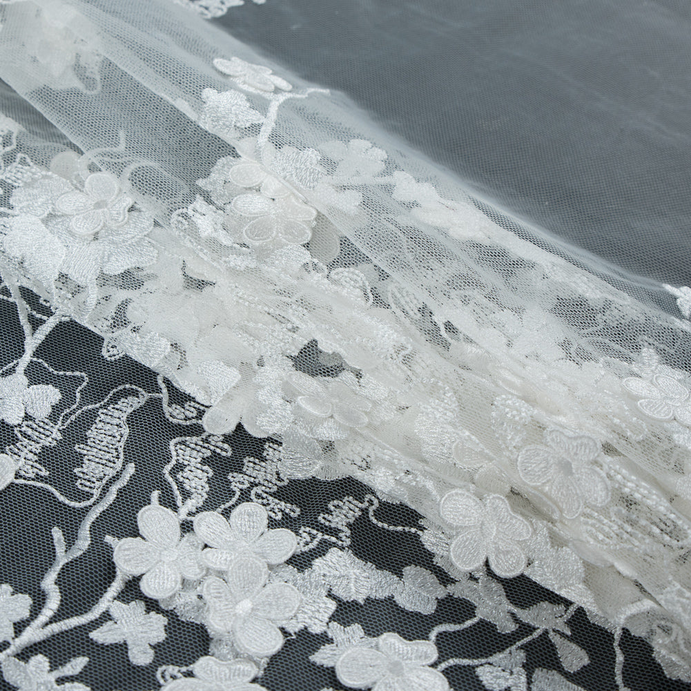Off-White 3D Floral Embroidered Lace on a Stretch Netting - Detail Off-White 3D Floral Embroidered Lace on a Stretch Netting - Detail