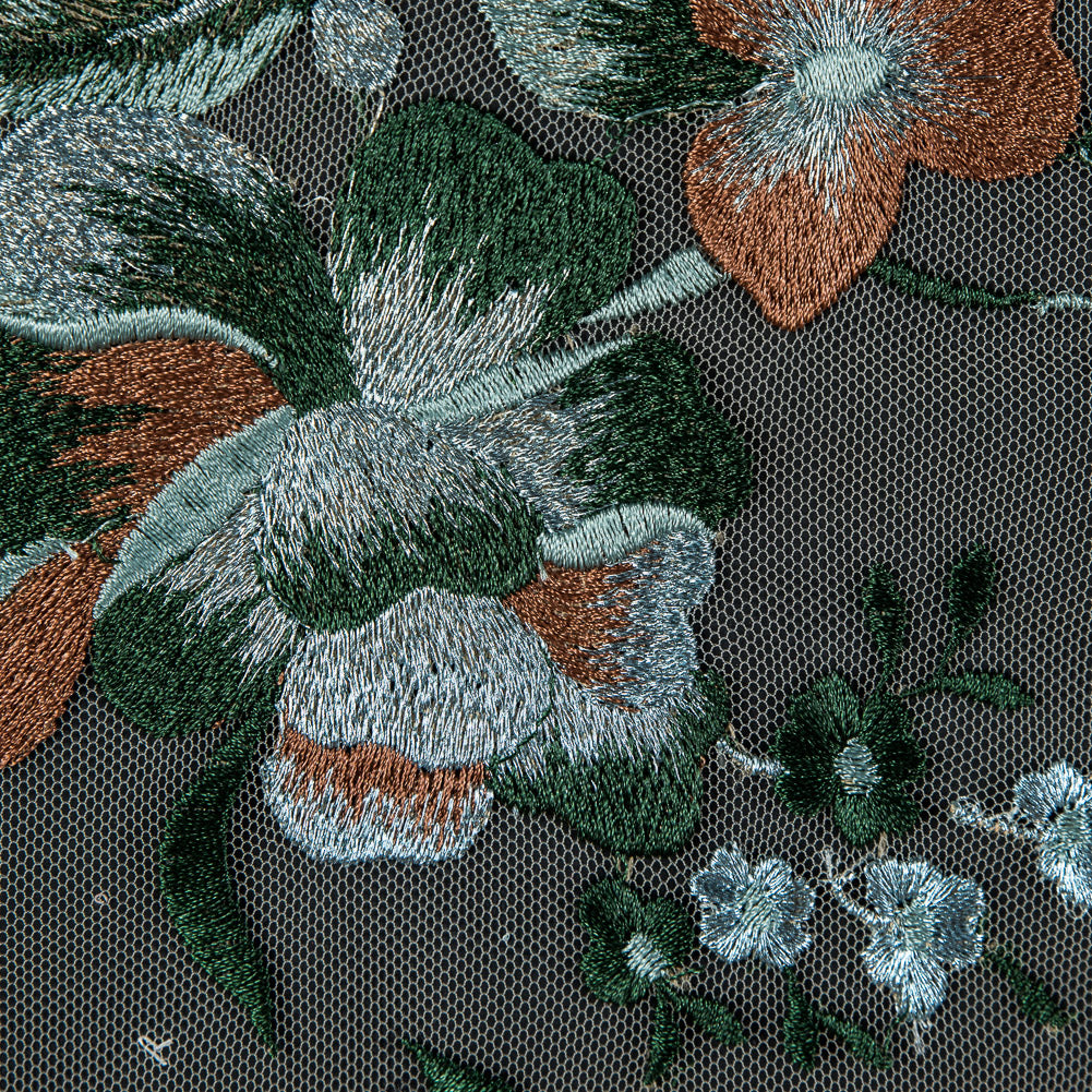 Metallic Whispering Blue, Greener Pastures and Sierra Floral Embroidered Lace on a Nude Netting Detail Metallic Whispering Blue, Greener Pastures and Sierra Floral Embroidered Lace on a Nude Netting Detail