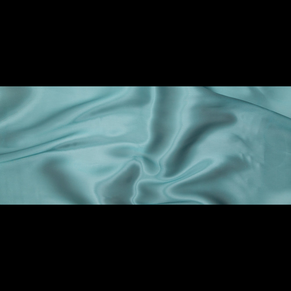 Satin-Faced Twill Organza - Luminous Teal - Anise Collection Folded Satin-Faced Twill Organza - Luminous Teal - Anise Collection Folded