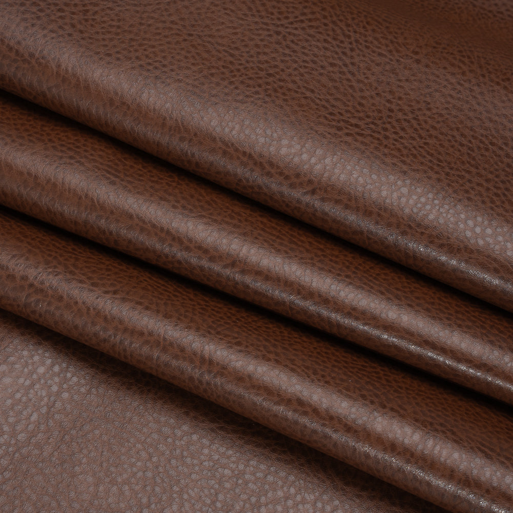 Peanut Pebbled Faux Leather with Woven Backing Folded Peanut Pebbled Faux Leather with Woven Backing Folded