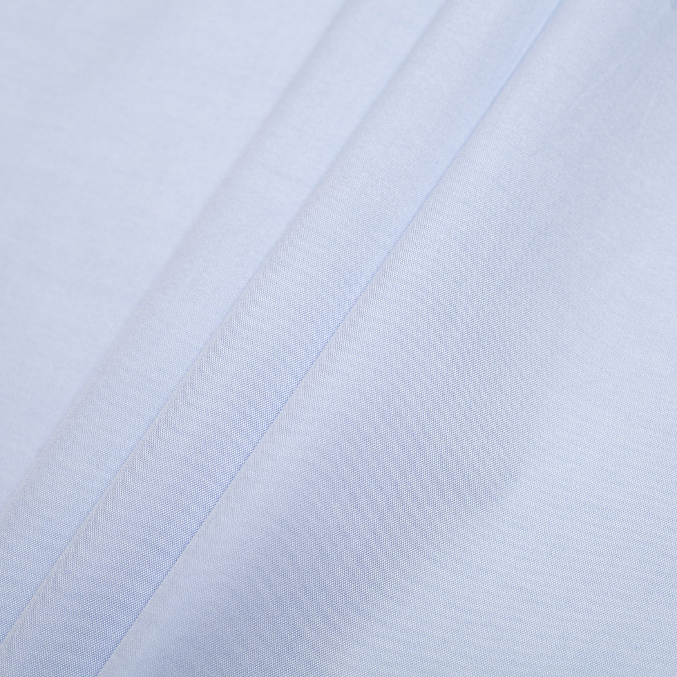 Light Blue Pinpoint Cotton Shirting - Folded Light Blue Pinpoint Cotton Shirting - Folded