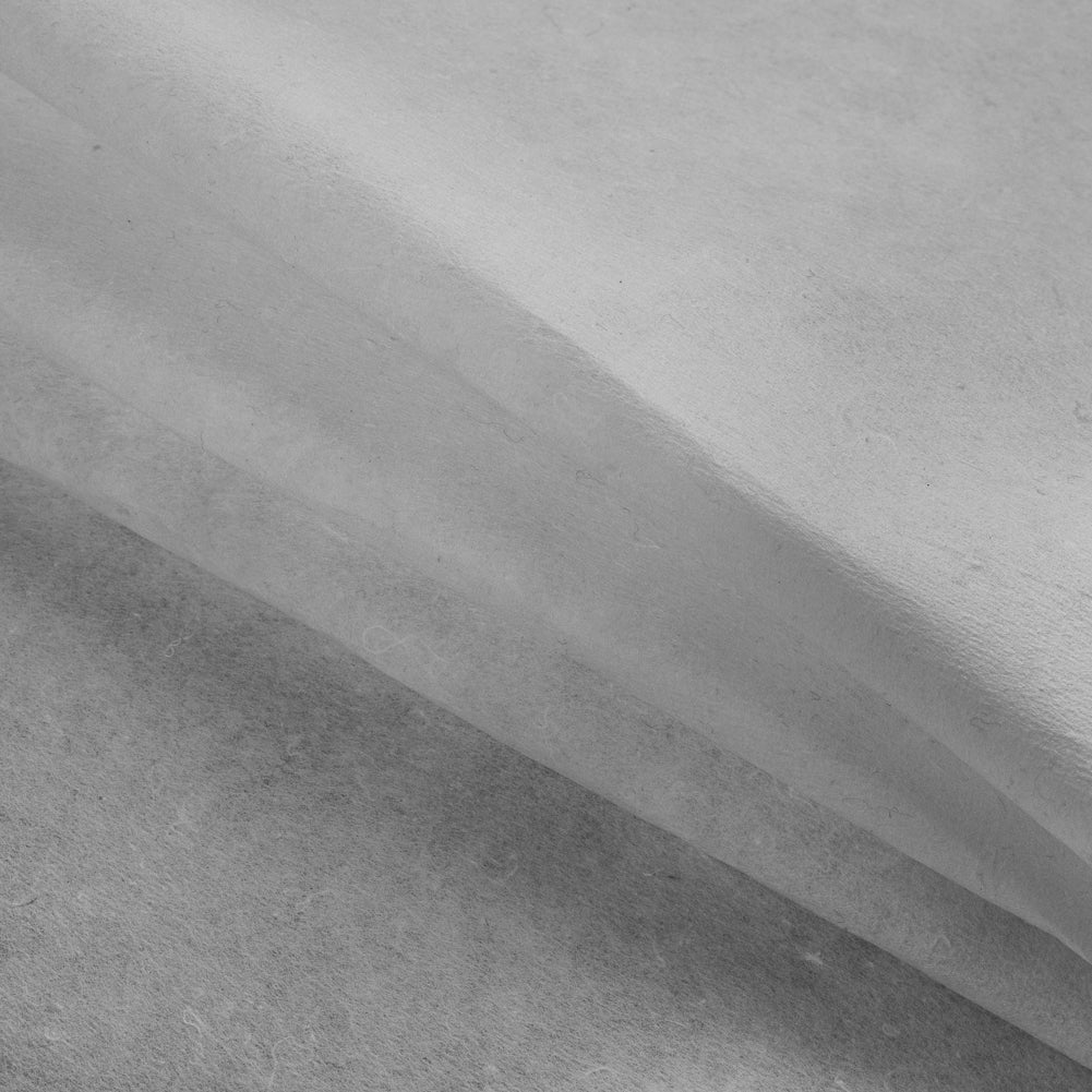 White Embroidery Backing and Stiffener Folded White Embroidery Backing and Stiffener Folded