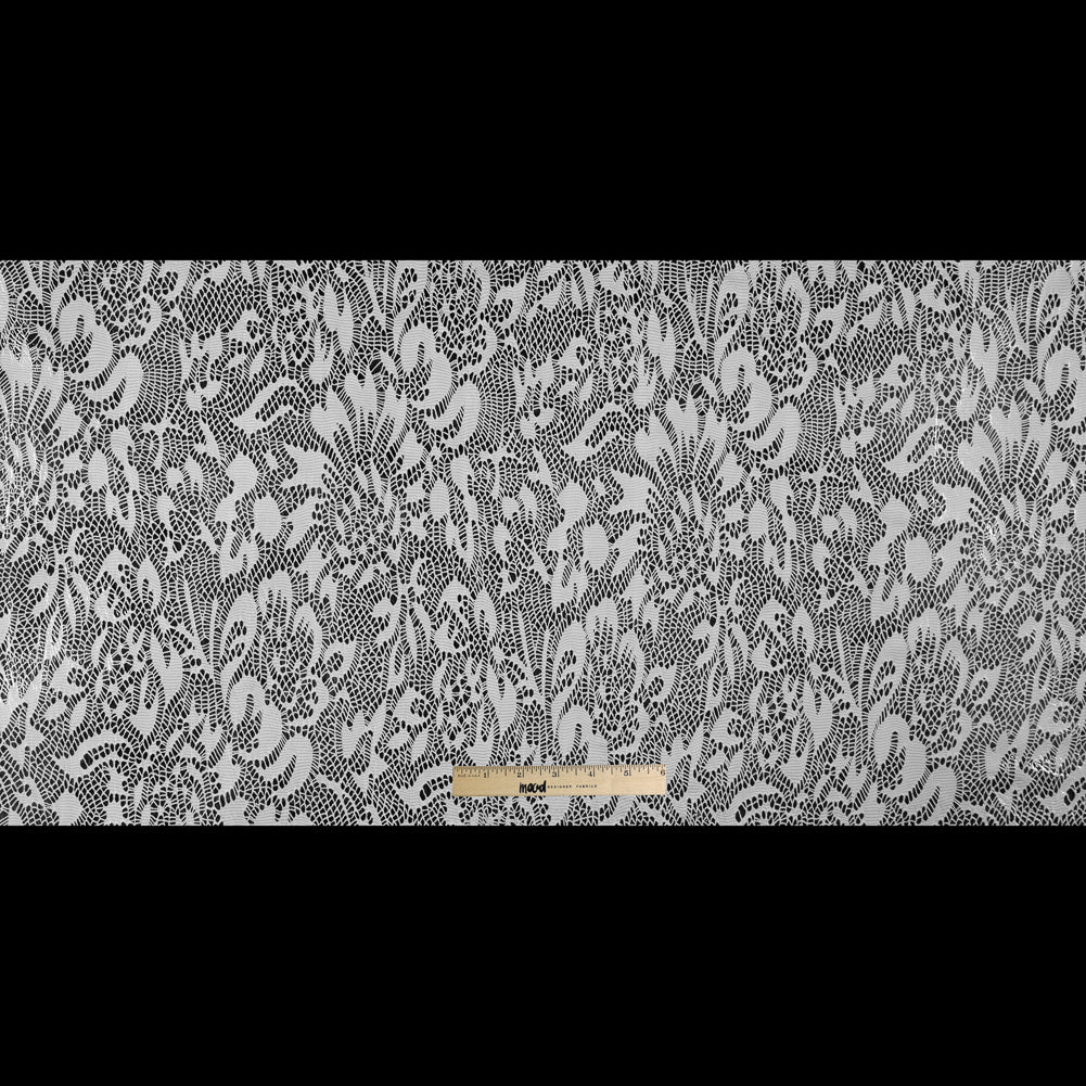 Italian White Laminated Lace - Folded Italian White Laminated Lace - Folded