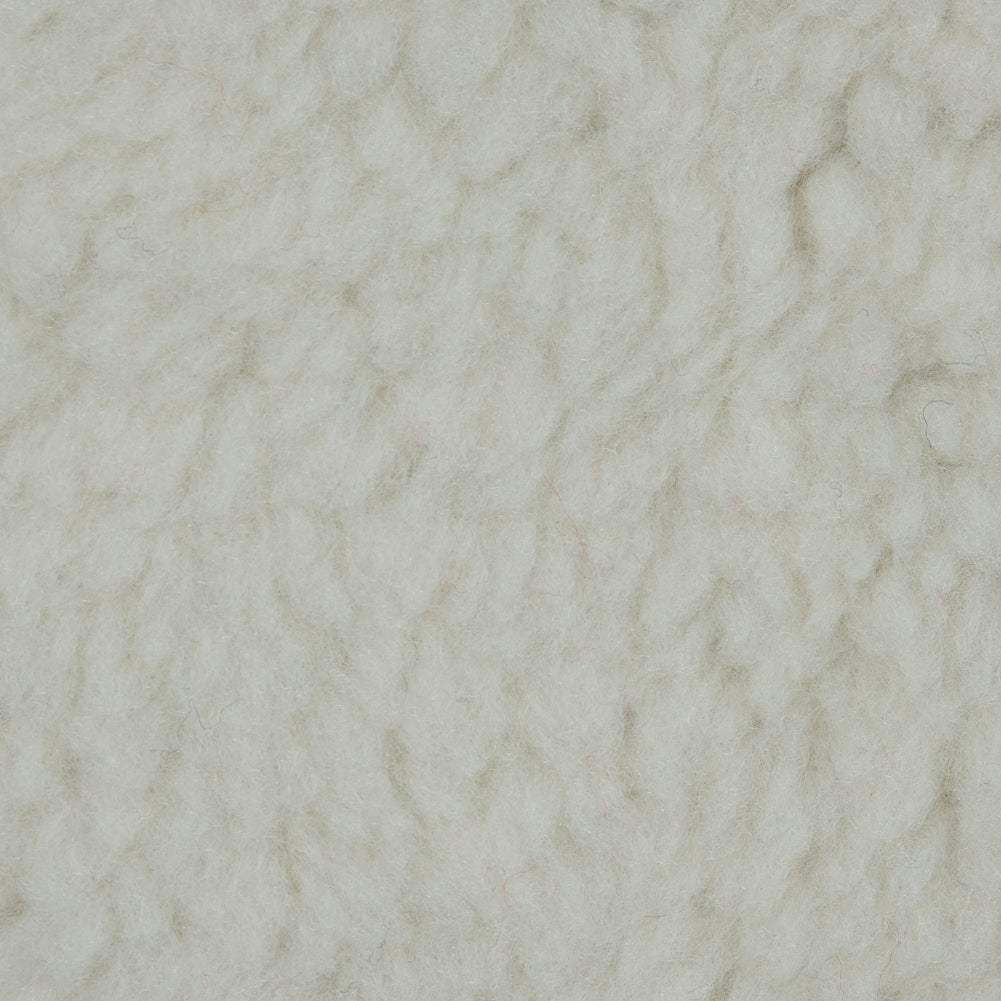 White Faux Shearling with Black Felted Wool Backing - Detail White Faux Shearling with Black Felted Wool Backing - Detail