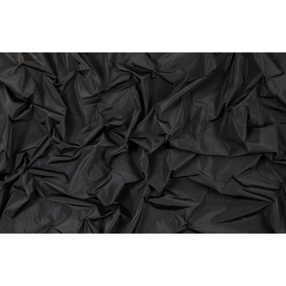 Black Wind Resistant Polyester with P/D Finishing - 75D*75D - Folded Black Wind Resistant Polyester with P/D Finishing - 75D*75D - Folded