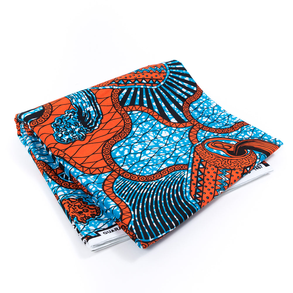 Hawaiian Blue and Mandarin Soda Can Waxed Cotton African Print Hawaiian Blue and Mandarin Soda Can Waxed Cotton African Print