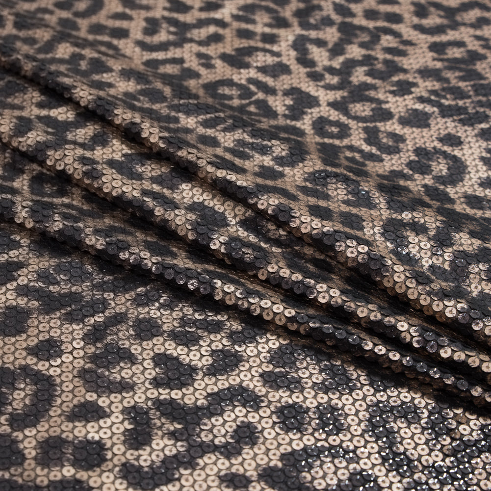 Knit Fabric with Snow Leopard Foil and Circle Sequins - Beige and Black on Black Folded Knit Fabric with Snow Leopard Foil and Circle Sequins - Beige and Black on Black Folded