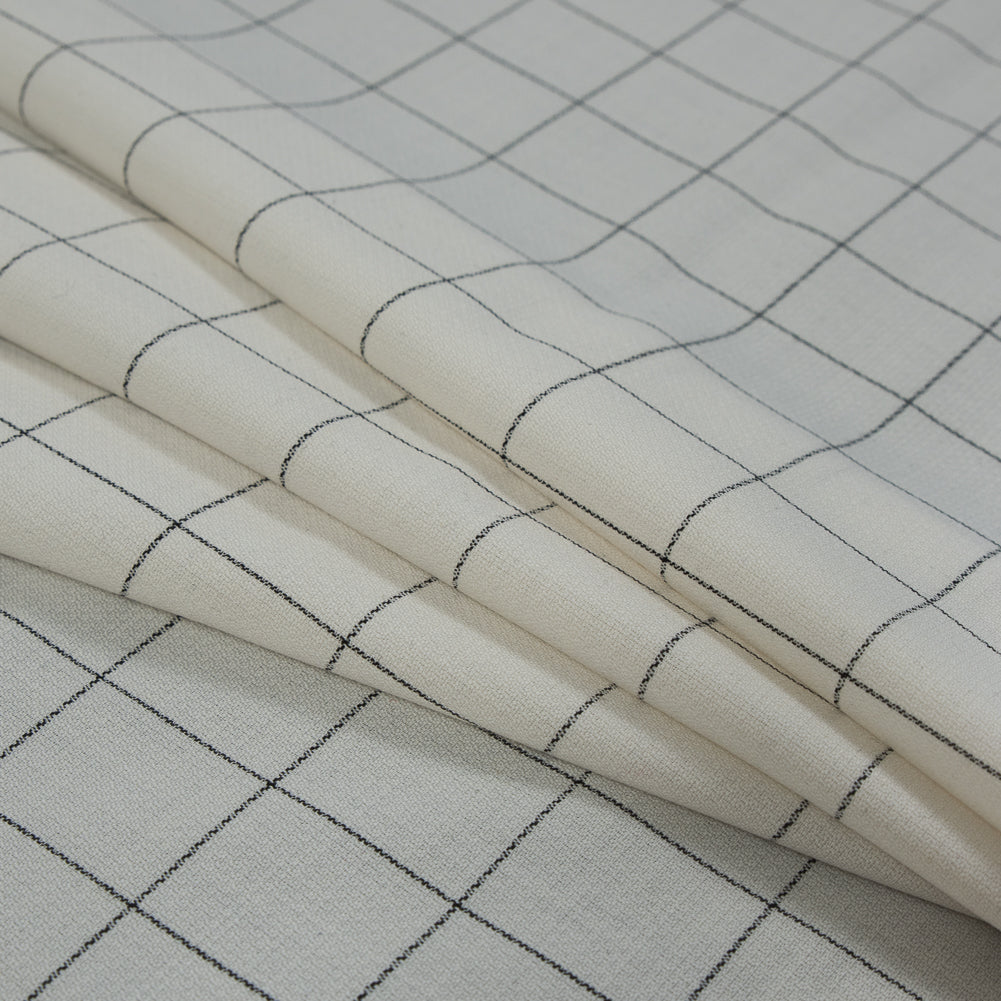 Super 150 Spill Repellent Wool Suiting - Ivory and Black Windowpane Check Folded Super 150 Spill Repellent Wool Suiting - Ivory and Black Windowpane Check Folded