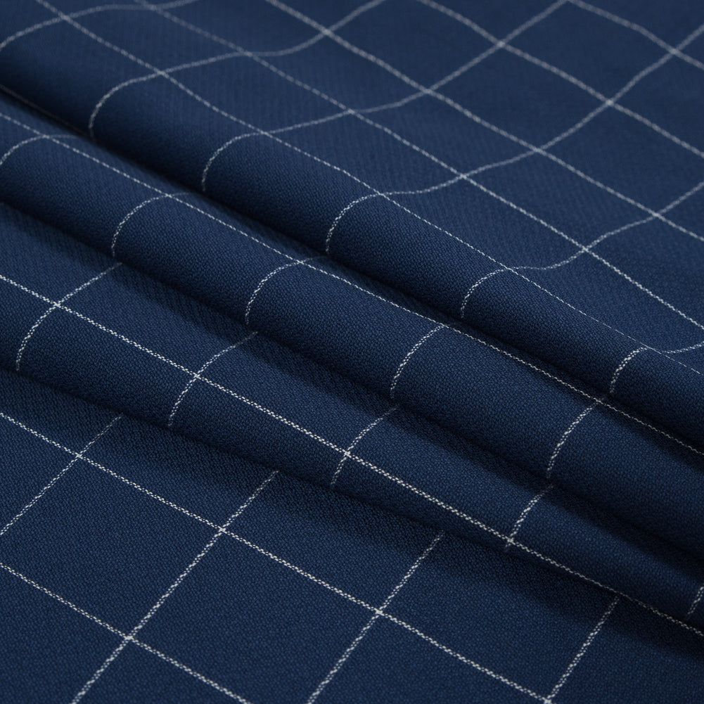 Super 150 Spill Repellent Wool Suiting - Blue and White Windowpane Check Folded Super 150 Spill Repellent Wool Suiting - Blue and White Windowpane Check Folded