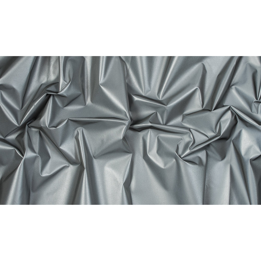 White Cotton-Backed Reflective Fabric Folded White Cotton-Backed Reflective Fabric Folded