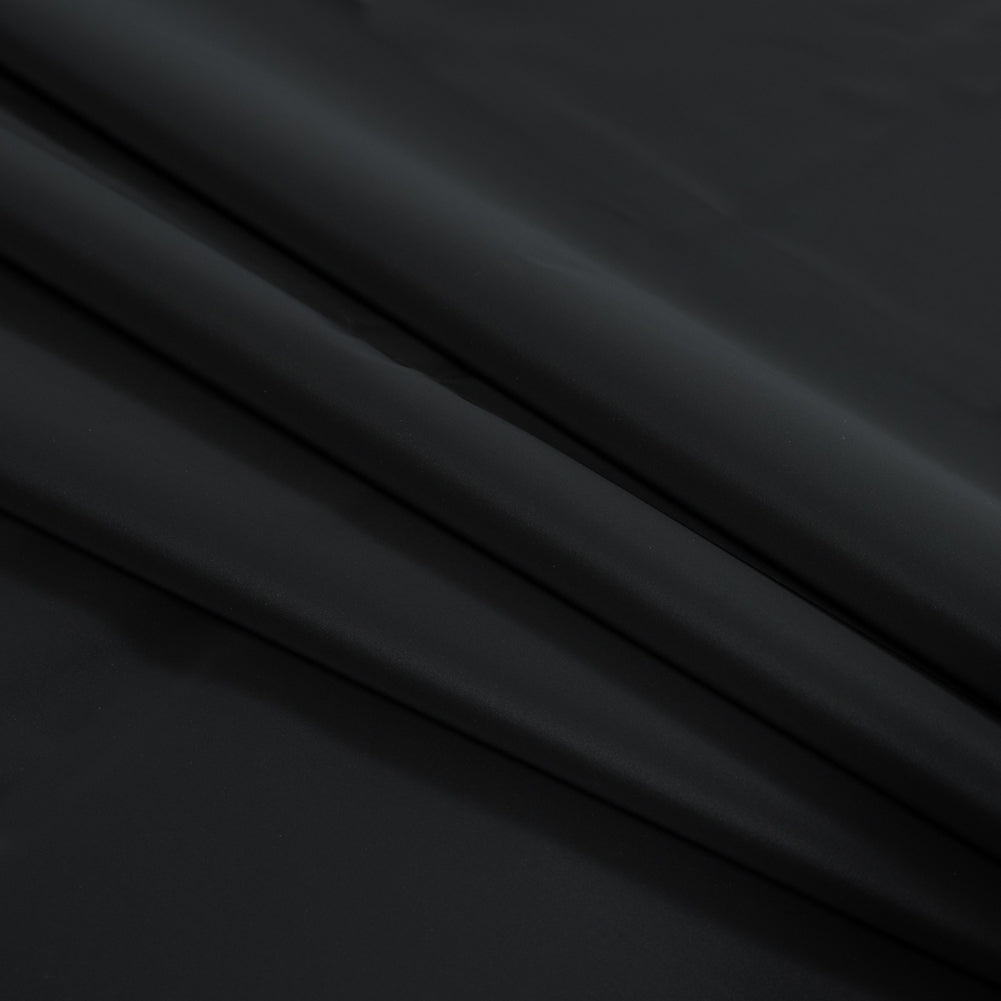 Black Cotton-Backed Reflective Fabric Detail Black Cotton-Backed Reflective Fabric Detail