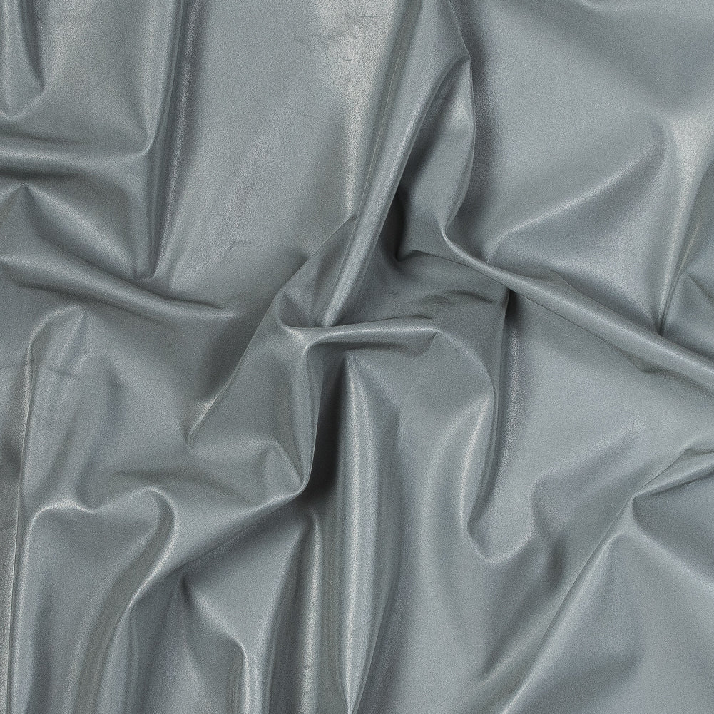 Silver Stretch Knit Reflective Fabric with White Backside Silver Stretch Knit Reflective Fabric with White Backside