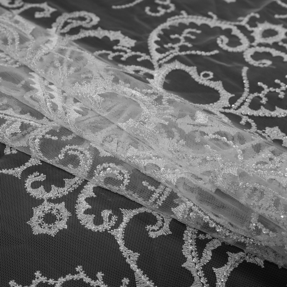 Embroidered Tulle with Sequins - Off White Fancy Swirls Folded Embroidered Tulle with Sequins - Off White Fancy Swirls Folded
