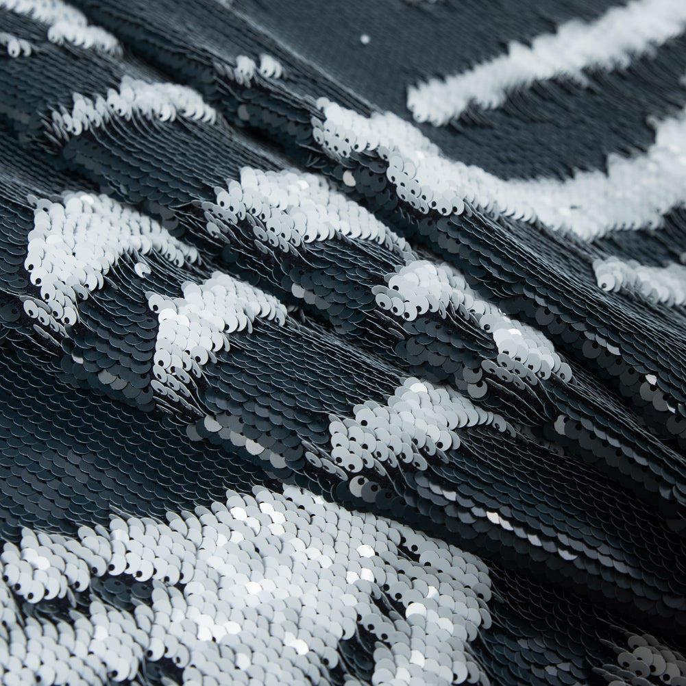 Italian Reversible Blue and White Sequins on a Navy Rayon Jersey Detail Italian Reversible Blue and White Sequins on a Navy Rayon Jersey Detail