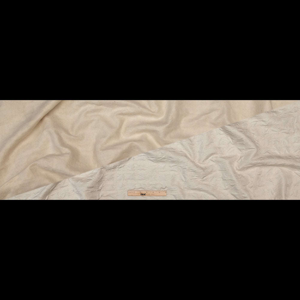 Ivory Bonded Taffeta and Wool Knit featuring Puckered Squares Folded Ivory Bonded Taffeta and Wool Knit featuring Puckered Squares Folded