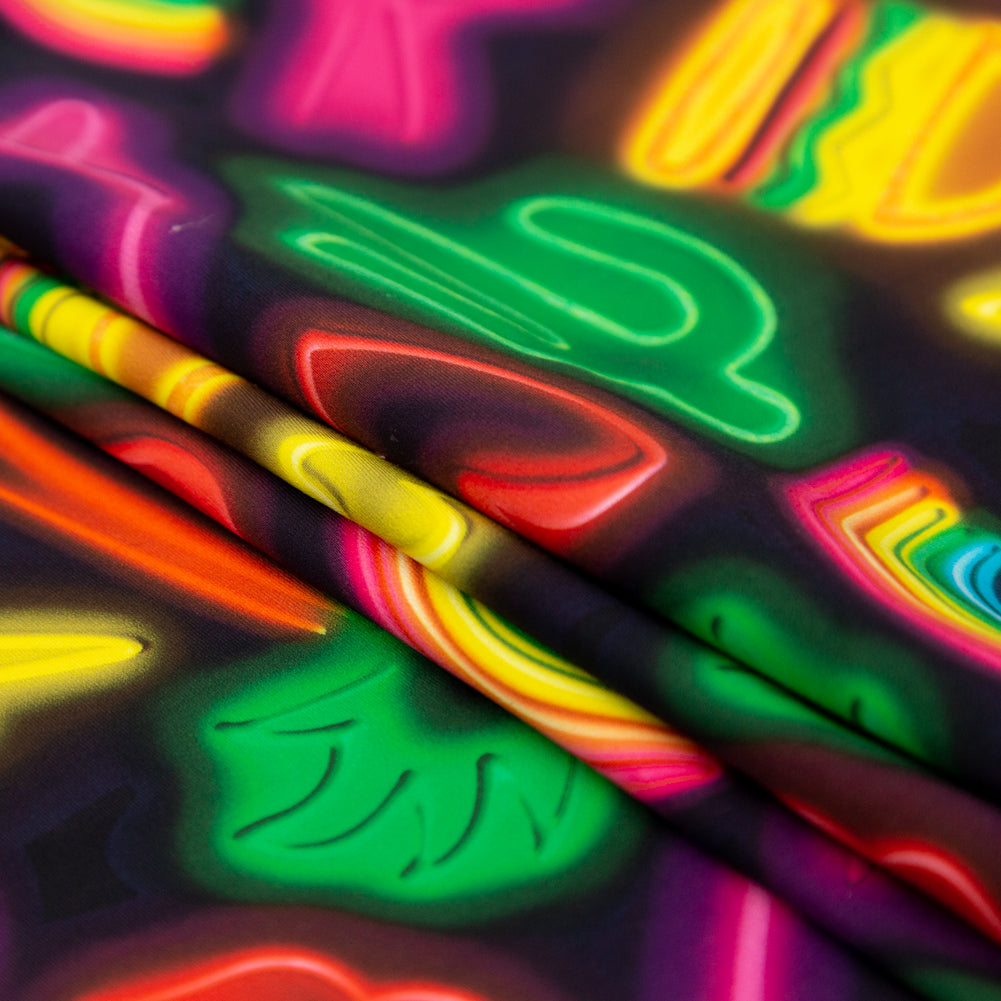 Compression Swimwear Tricot, UV Protective with Aloe Vera Microcapsules - Black Neon Emojis - Caye Collection Folded Compression Swimwear Tricot, UV Protective with Aloe Vera Microcapsules - Black Neon Emojis - Caye Collection Folded