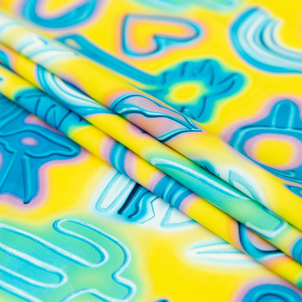 Compression Swimwear Tricot, UV Protective with Aloe Vera Microcapsules - Blue and Yellow Emojis - Caye Collection Folded Compression Swimwear Tricot, UV Protective with Aloe Vera Microcapsules - Blue and Yellow Emojis - Caye Collection Folded