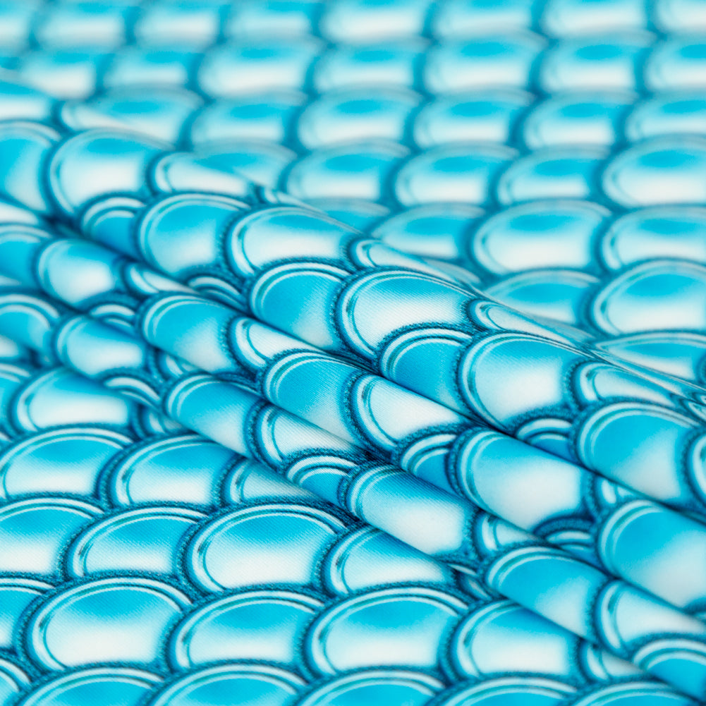 Compression Swimwear Tricot, UV Protective with Aloe Vera Microcapsules - Cerulean Blue Coins - Caye Collection Folded