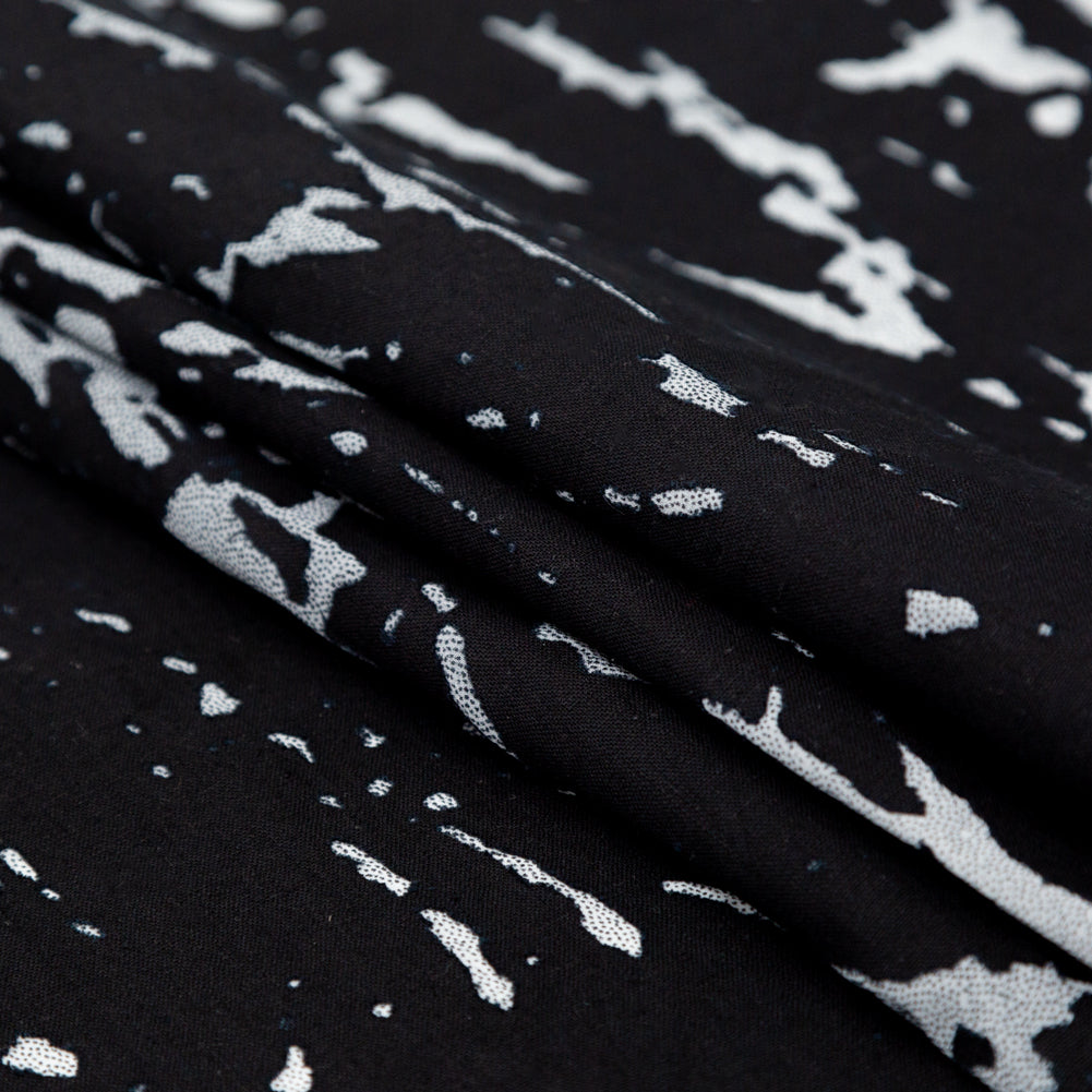 Black and White Abstract Burnout Polyester Woven with Fused Backing Folded Black and White Abstract Burnout Polyester Woven with Fused Backing Folded