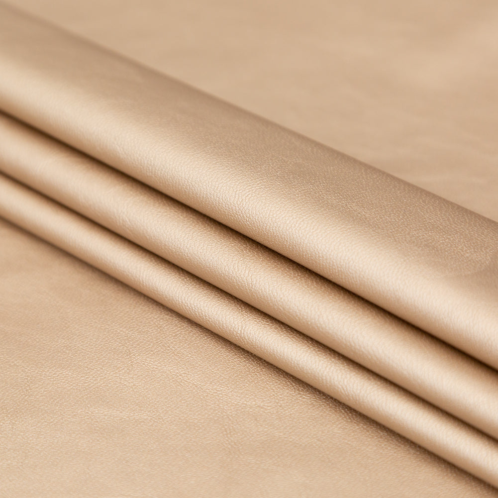 Italian Metallic Champagne Faux Leather Laminate over a Latte Stretch Faux Suede Folded Italian Metallic Champagne Faux Leather Laminate over a Latte Stretch Faux Suede Folded