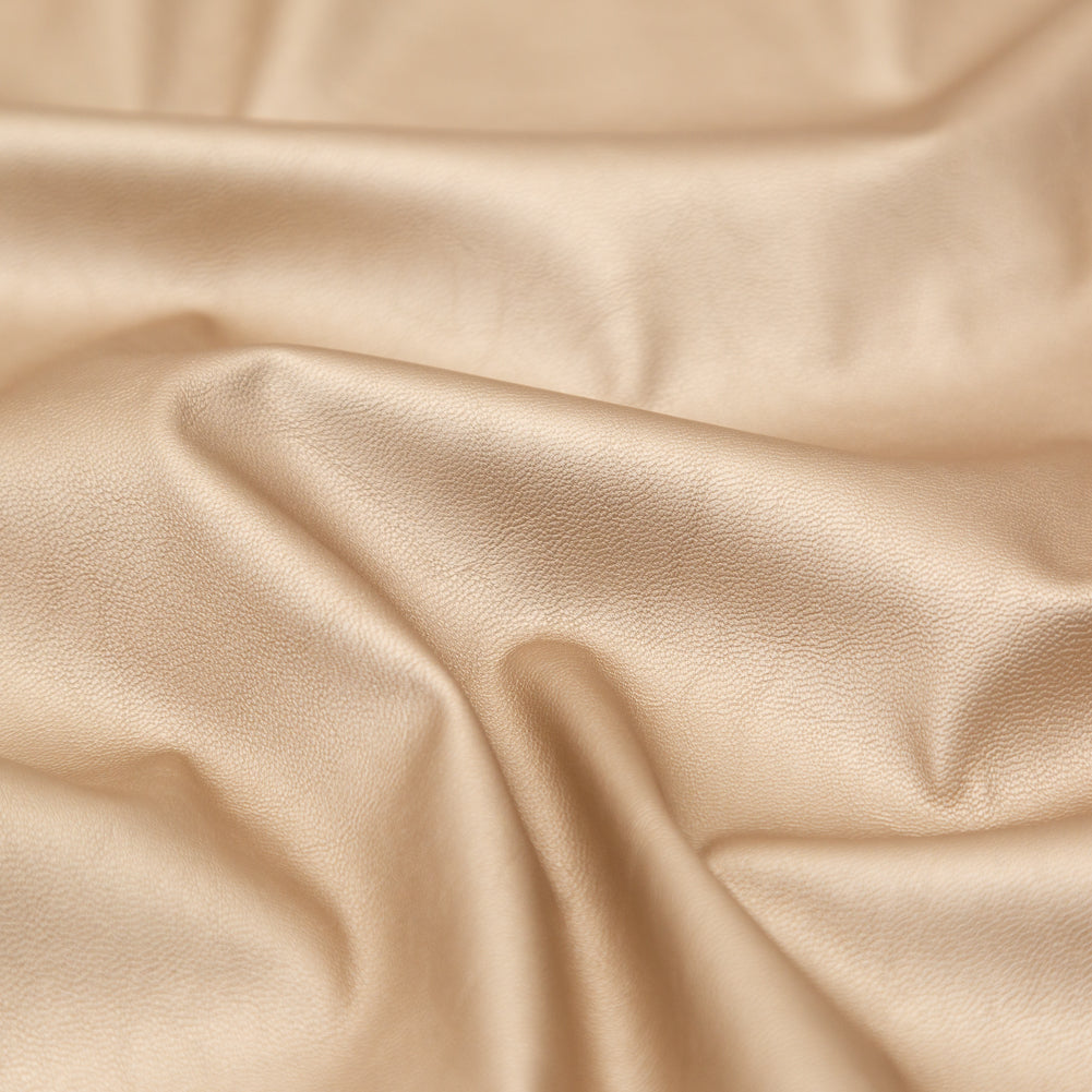 Italian Metallic Champagne Faux Leather Laminate over a Latte Stretch Faux Suede Detail Italian Metallic Champagne Faux Leather Laminate over a Latte Stretch Faux Suede Detail