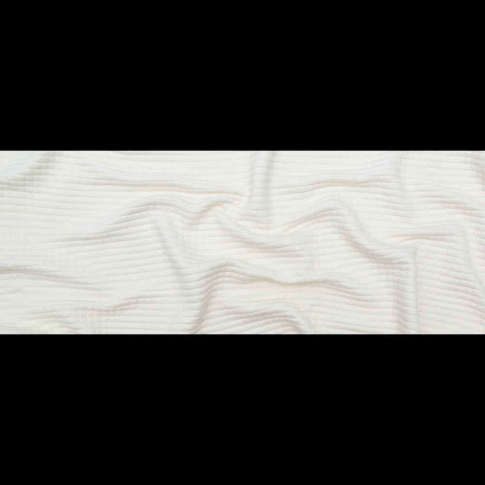 Italian Cream Quilted Rayon Knit with Filler and Polyester Knit Backing Full Italian Cream Quilted Rayon Knit with Filler and Polyester Knit Backing Full