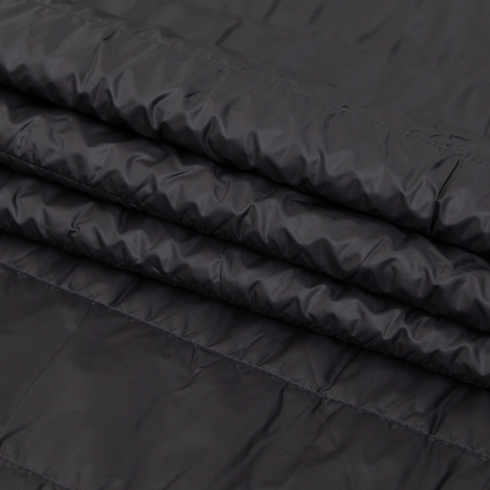 Black Rectangular Ribs Quilted Coating with Knit Backing Folded Black Rectangular Ribs Quilted Coating with Knit Backing Folded