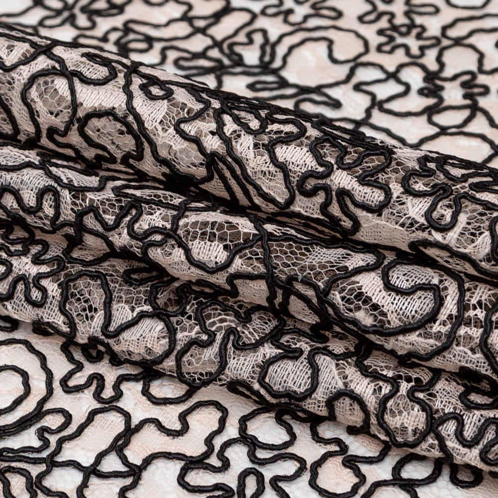 Peach Floral Chantilly Lace with Black Abstract Cording Folded Peach Floral Chantilly Lace with Black Abstract Cording Folded