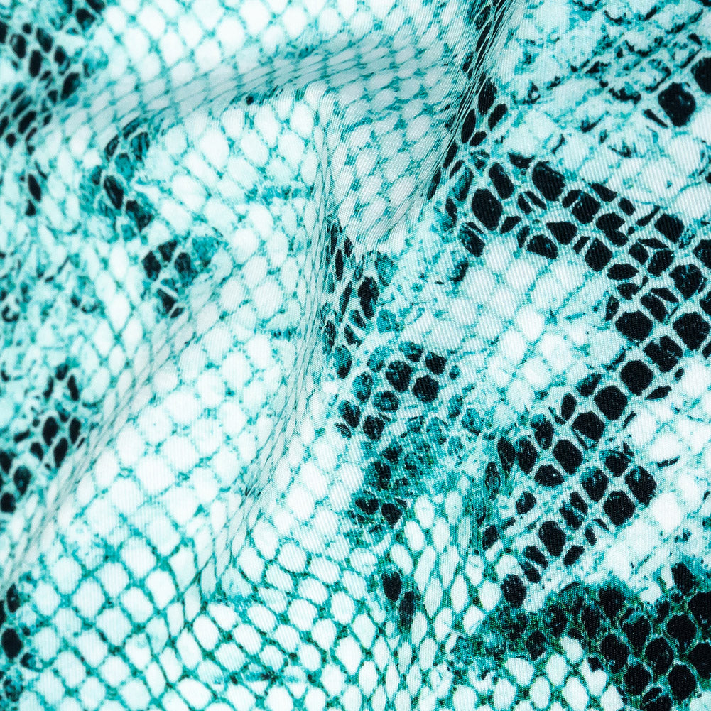 Compression Swimwear Tricot, UV Protective with Aloe Vera Microcapsules - Turquoise Python - Caye Collection Detail Compression Swimwear Tricot, UV Protective with Aloe Vera Microcapsules - Turquoise Python - Caye Collection Detail
