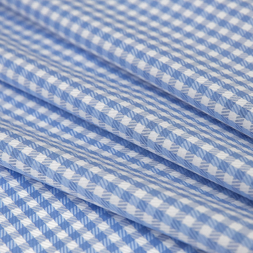 Premium Light Blue and White Checkered and Herringbone Cotton Dobby Shirting Folded Premium Light Blue and White Checkered and Herringbone Cotton Dobby Shirting Folded