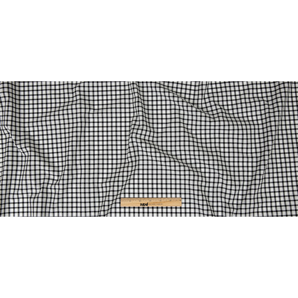 Premium Black and White Patterned Checks Two-Ply Cotton Shirting Folded Premium Black and White Patterned Checks Two-Ply Cotton Shirting Folded