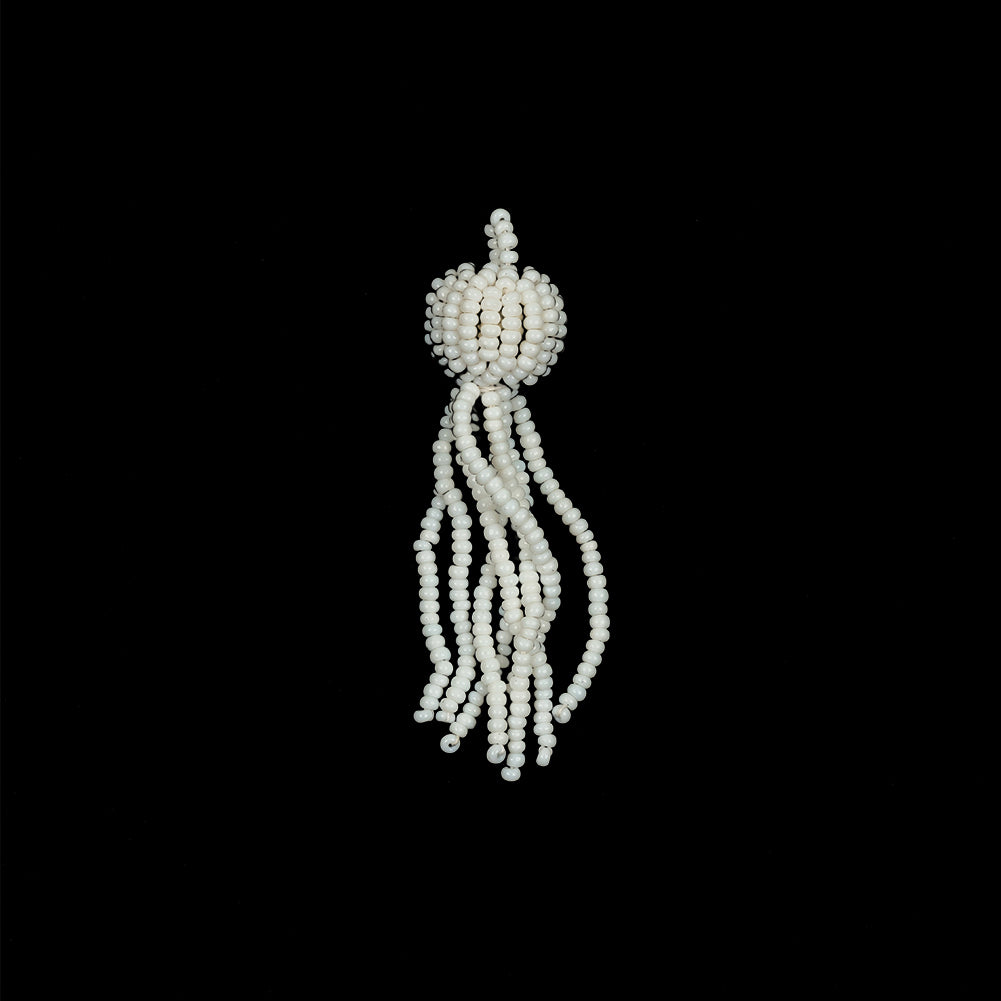 Vintage White Glass Beaded Tassel Ornament - 2.25" x 0.5625" Vintage White Glass Beaded Tassel Ornament - 2.25" x 0.5625"