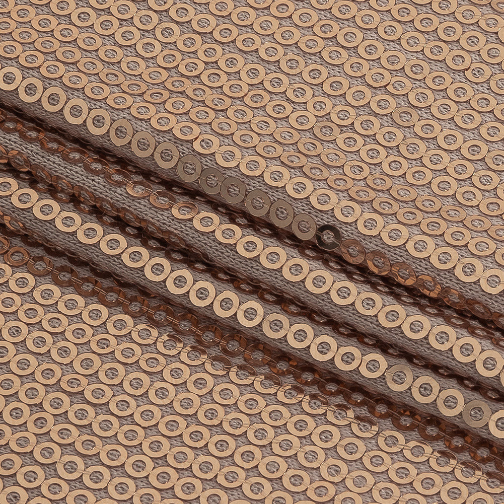 Italian Rose Gold Linear Circular Baby Sequins on Rayon Jersey Folded Italian Rose Gold Linear Circular Baby Sequins on Rayon Jersey Folded