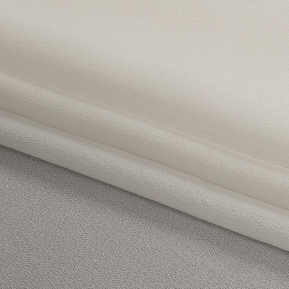 Famous Australian Designer Ivory High-Multitwist Polyester Georgette Folded Famous Australian Designer Ivory High-Multitwist Polyester Georgette Folded