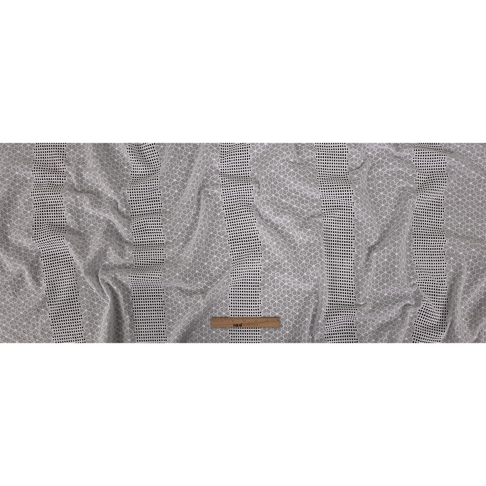 White Floral Embroidered Cotton Voile with Gridded Guipure Lace Stripes Folded White Floral Embroidered Cotton Voile with Gridded Guipure Lace Stripes Folded