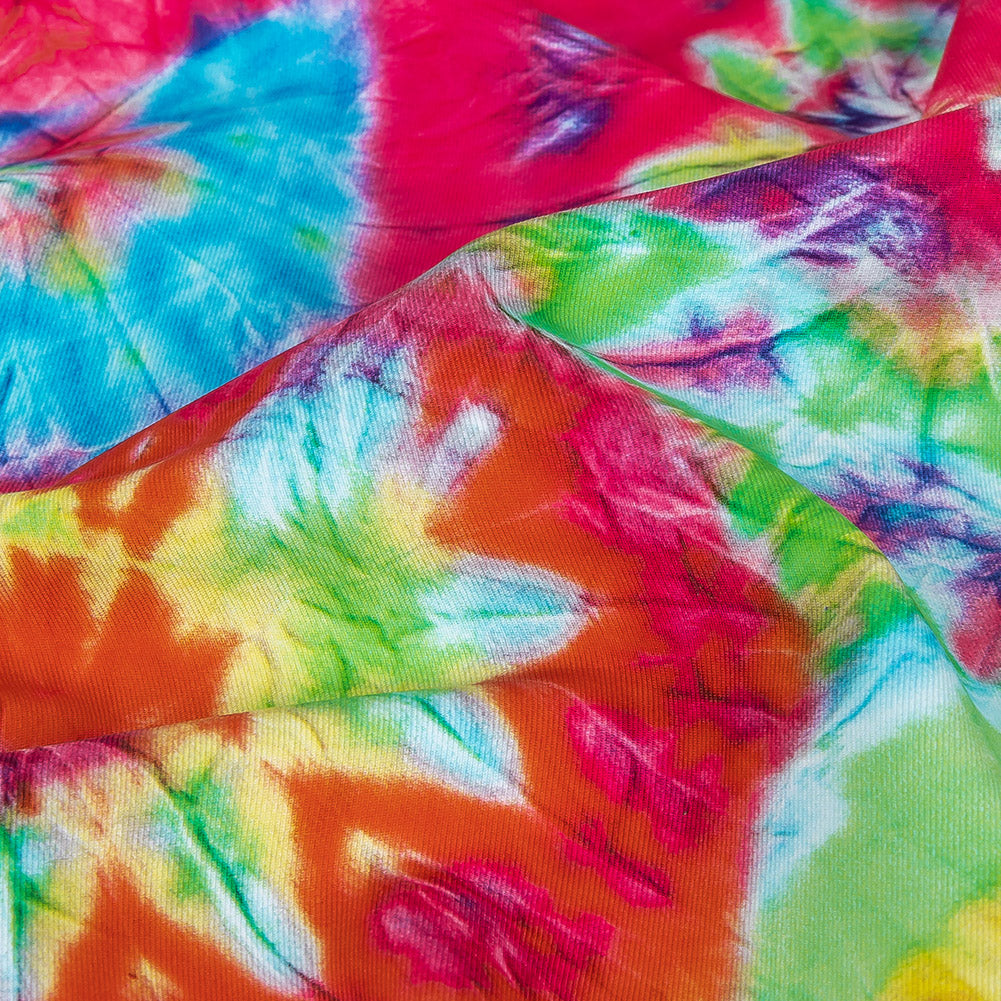 Traje de baño de compresión con protección UV y estampado tie-dye arrugado de arcoíris brillante, confeccionado en tricot con microcápsulas de aloe vera. Traje de baño de compresión con protección UV y estampado tie-dye arrugado de arcoíris brillante, confeccionado en tricot con microcápsulas de aloe vera.