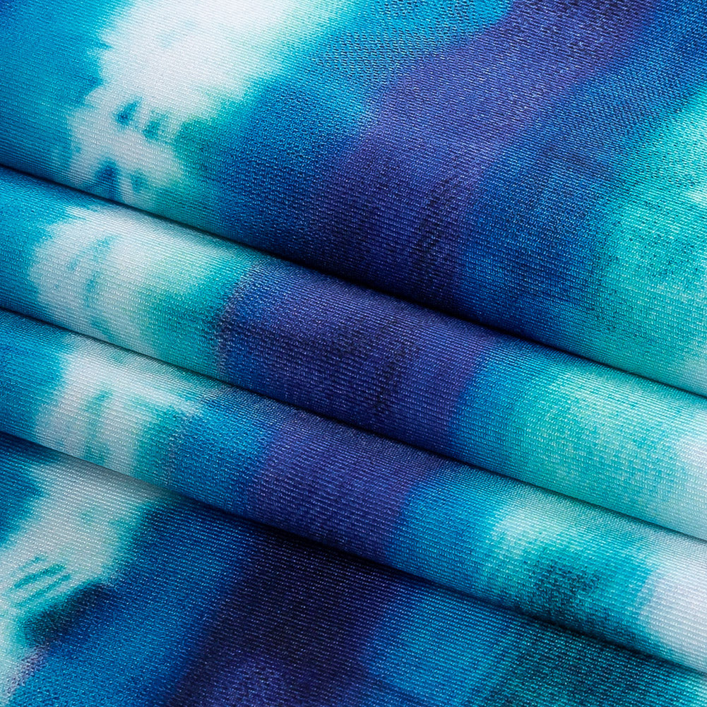 Traje de baño de compresión de tricot, con protección UV y microcápsulas de aloe vera - Rayas tie-dye en azul ultramarino intenso, verde azulado y blanco - Colección Caye Traje de baño de compresión de tricot, con protección UV y microcápsulas de aloe vera - Rayas tie-dye en azul ultramarino intenso, verde azulado y blanco - Colección Caye