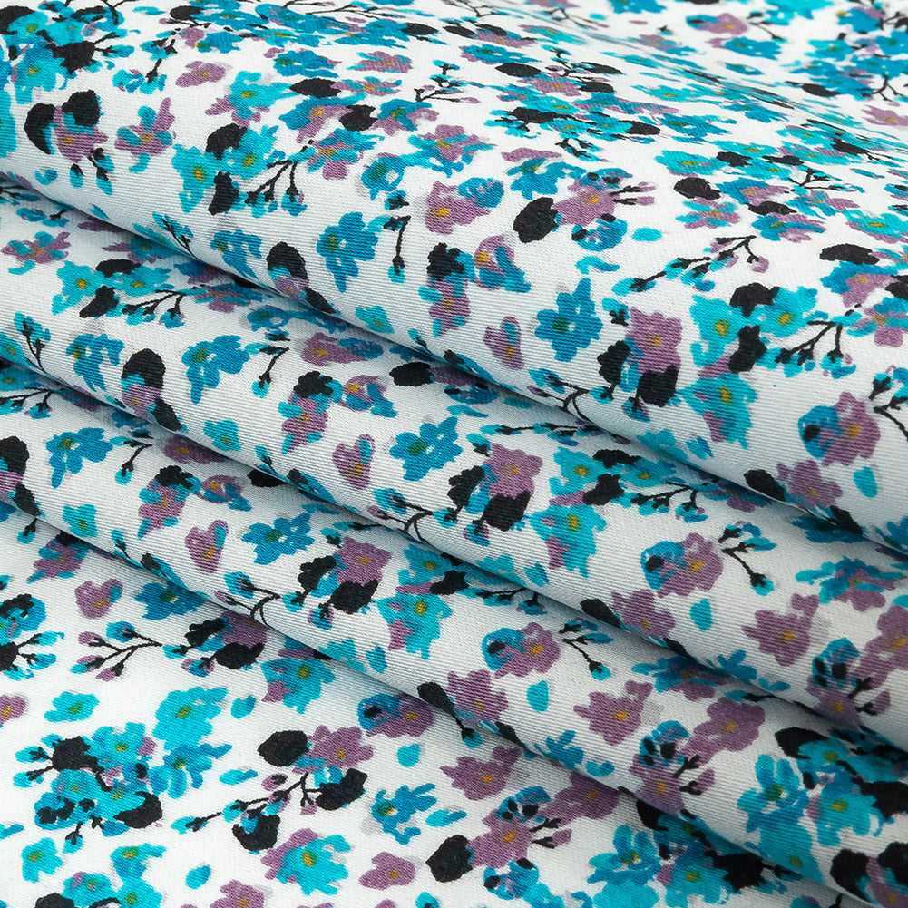 Turquoise, Lilac, and White Tiny Flowers Cotton Shirting Folded Turquoise, Lilac, and White Tiny Flowers Cotton Shirting Folded