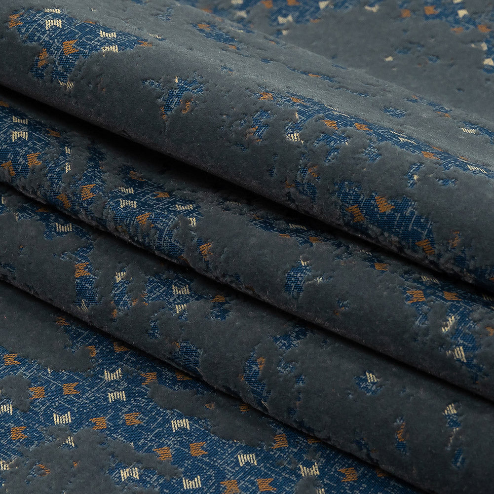 Gray Distressed Flocking on Blue, Tan and Beige Geometric Printed Cotton Shirting Folded Gray Distressed Flocking on Blue, Tan and Beige Geometric Printed Cotton Shirting Folded