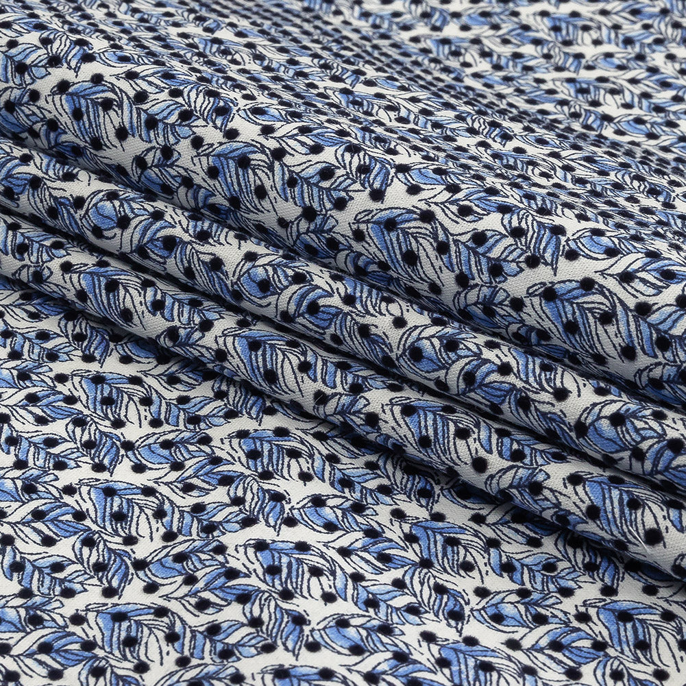 Black Flocked Polka Dots on Blue and White Leaves Stretch Cotton Shirting Folded Black Flocked Polka Dots on Blue and White Leaves Stretch Cotton Shirting Folded