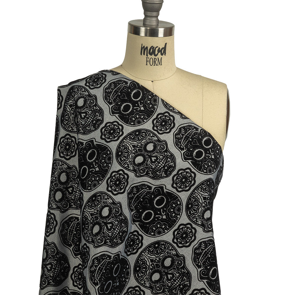 Black Flocked Decorated Skulls on Silver Sconce Diamonds Cotton and Polyester Dobby Drape Black Flocked Decorated Skulls on Silver Sconce Diamonds Cotton and Polyester Dobby Drape