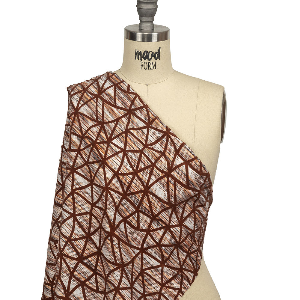 Brown Flocked Geometric Web on Brown, Orange and White Distressed Stripes Stretch Cotton Twill Drape Brown Flocked Geometric Web on Brown, Orange and White Distressed Stripes Stretch Cotton Twill Drape