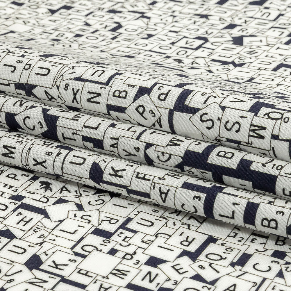 Navy Blazer, Vulcan and Snow White Word Game Tiles Stretch Cotton Shirting Folded Navy Blazer, Vulcan and Snow White Word Game Tiles Stretch Cotton Shirting Folded