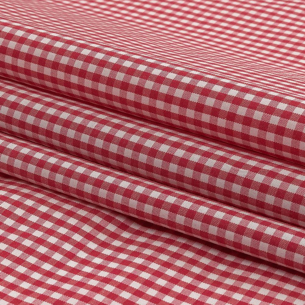 Red and White Checked Cotton and Polyester Shirting Folded Red and White Checked Cotton and Polyester Shirting Folded