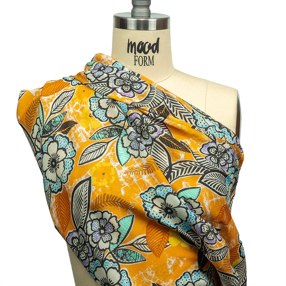 Gauzy Wrinkled Rayon Woven Print - Butterscotch Orange and Blue Floral - Mood Exclusive Blackened Buds Detail Gauzy Wrinkled Rayon Woven Print - Butterscotch Orange and Blue Floral - Mood Exclusive Blackened Buds Detail