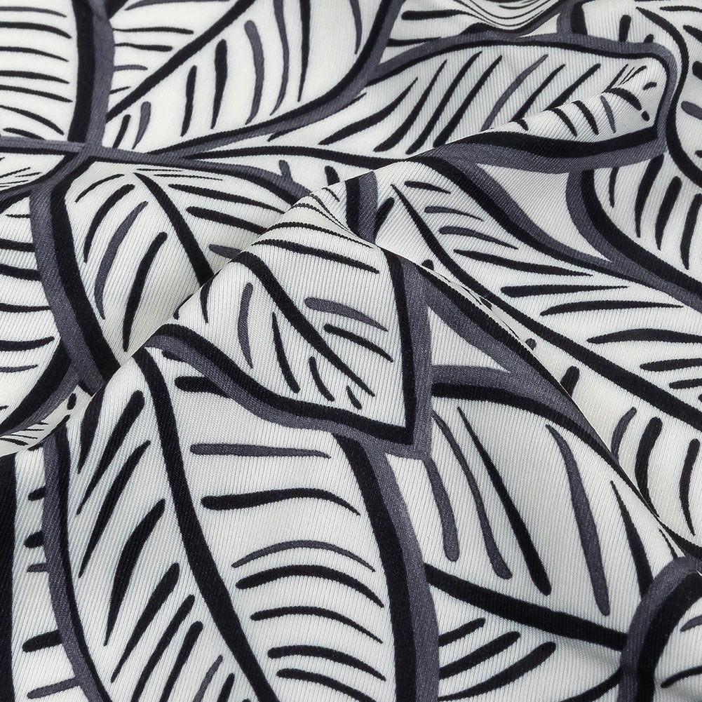 White, Folkstone Gray and Black Leaves UV Protective Compression Swimwear Tricot with Aloe Vera Microcapsules - Detail White, Folkstone Gray and Black Leaves UV Protective Compression Swimwear Tricot with Aloe Vera Microcapsules - Detail