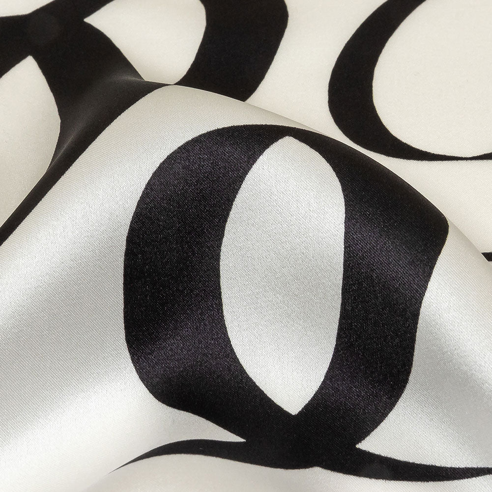 Mood Exclusive Italian Blanc de Blanc and Caviar Calligraphic Squiggles Silk Charmeuse Mood Exclusive Italian Blanc de Blanc and Caviar Calligraphic Squiggles Silk Charmeuse