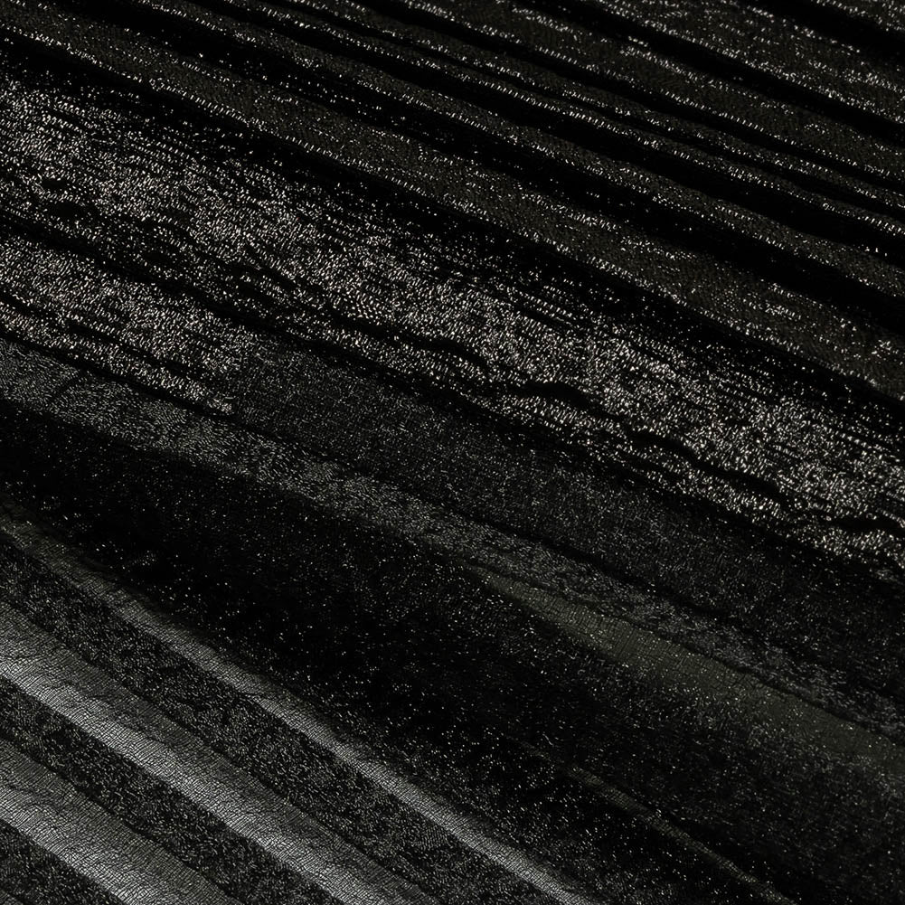 Brocado metálico negro ondulado plisado de lujo con efecto burnout. Brocado metálico negro ondulado plisado de lujo con efecto burnout.