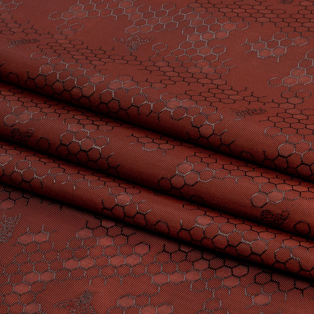 Burnt Orange Tonal Bee Hive Jacquard Lining Folded Burnt Orange Tonal Bee Hive Jacquard Lining Folded